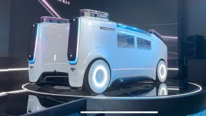 Didi Global unveils their latest vehicle, Didi Neuron - an autonomous concept car with robotic arms.