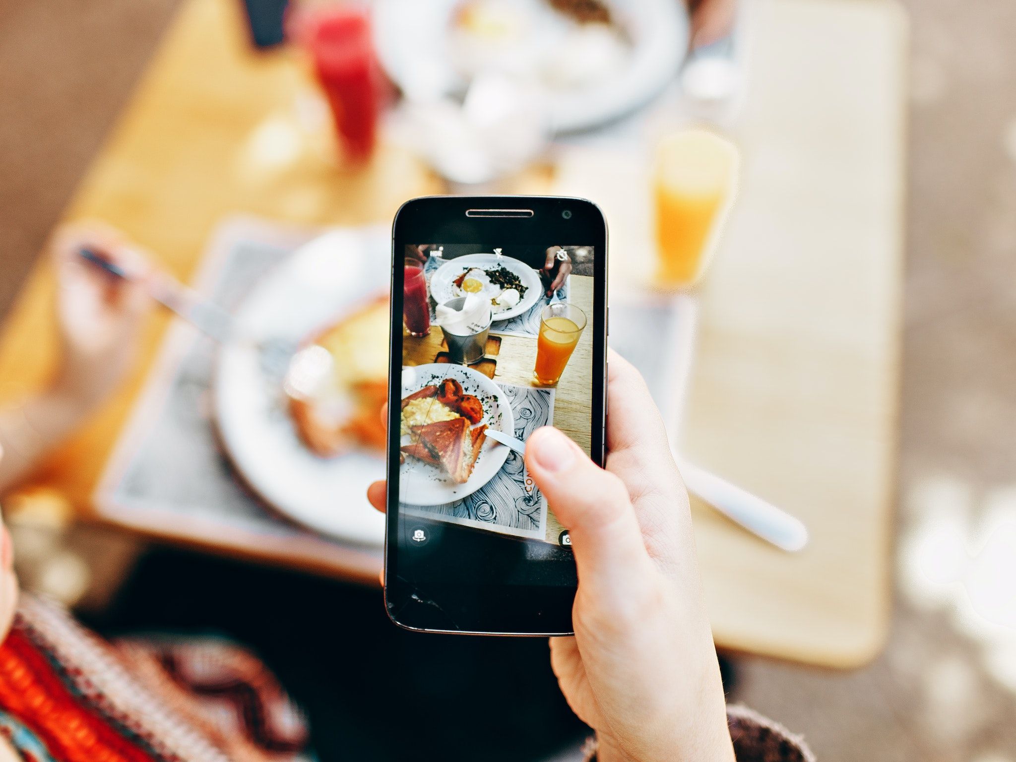 An iPhone user takes a photo to turn it into a sticker.