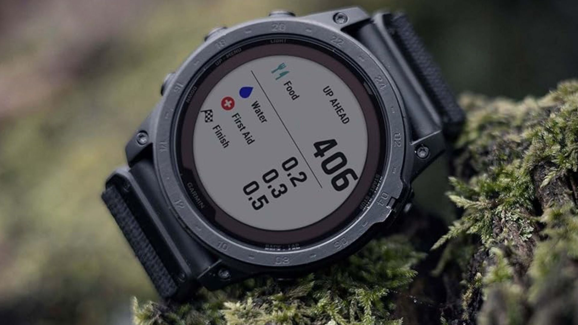Close-up of the Garmin Tactix 7 Standard Edition on a log.