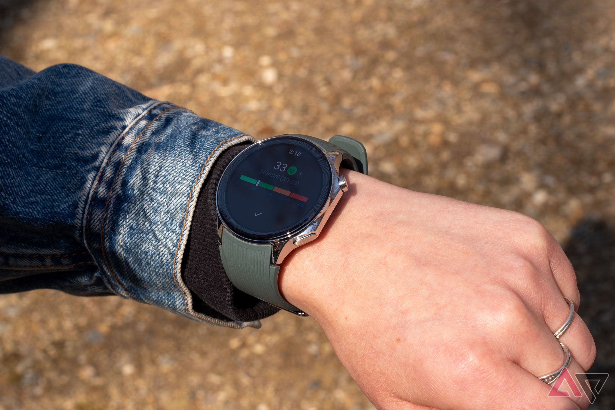 A smartwatch showing a stress evaluation interface.