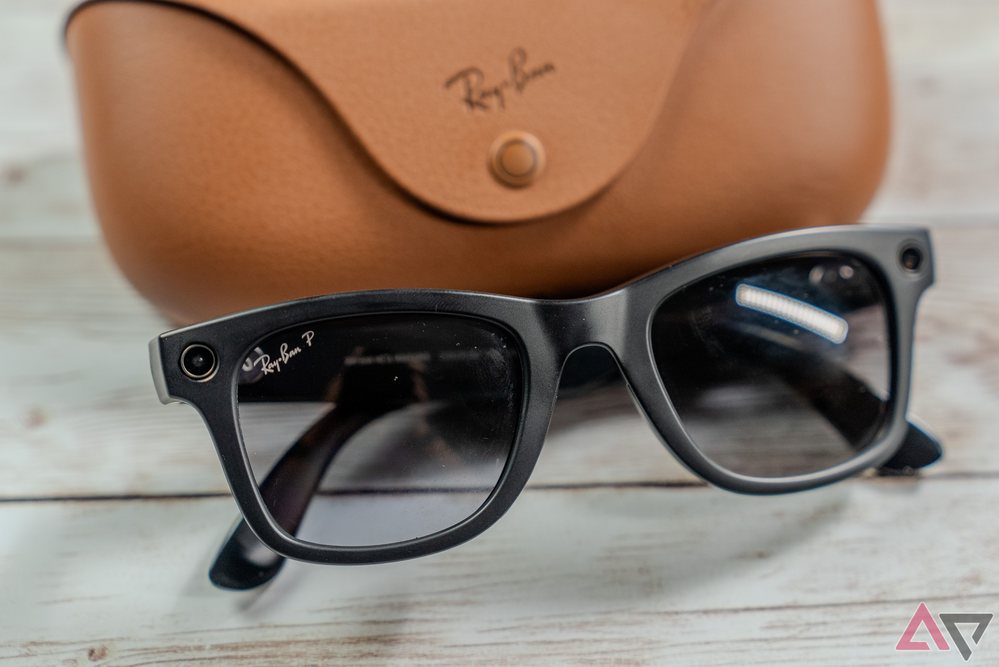 Ray-Ban Meta Black close-up with charging case in the background