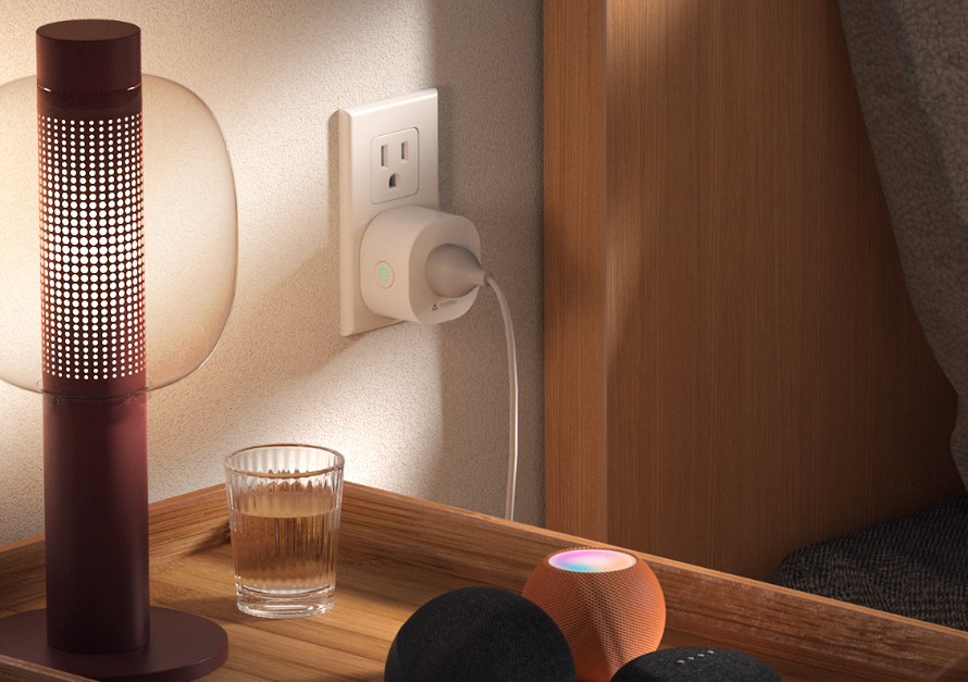 An image showing a Meross Matter plug in a power outlet next to a bed and nightstand