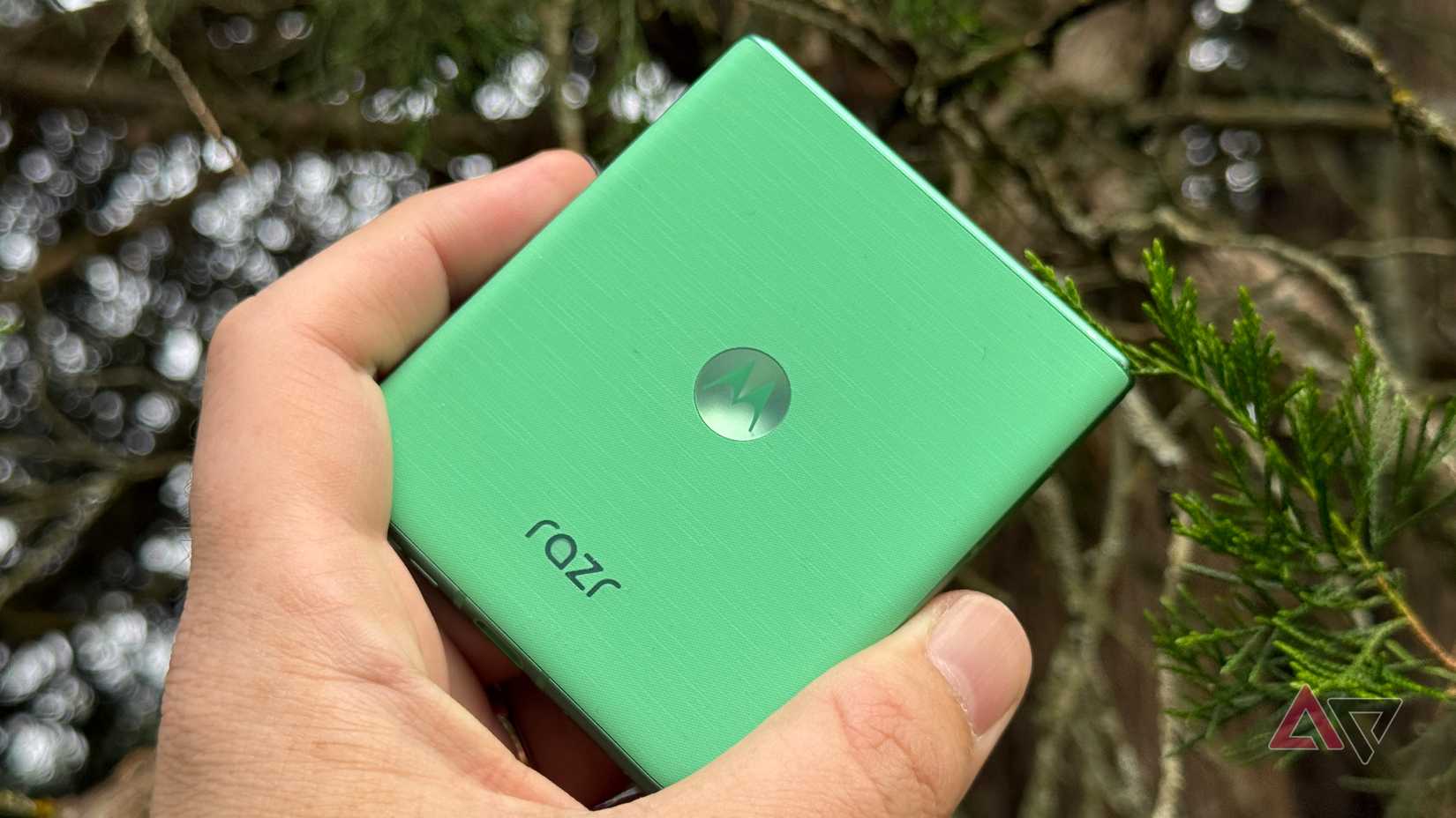 A phone showing the One UI 7 quick toggles on the screen