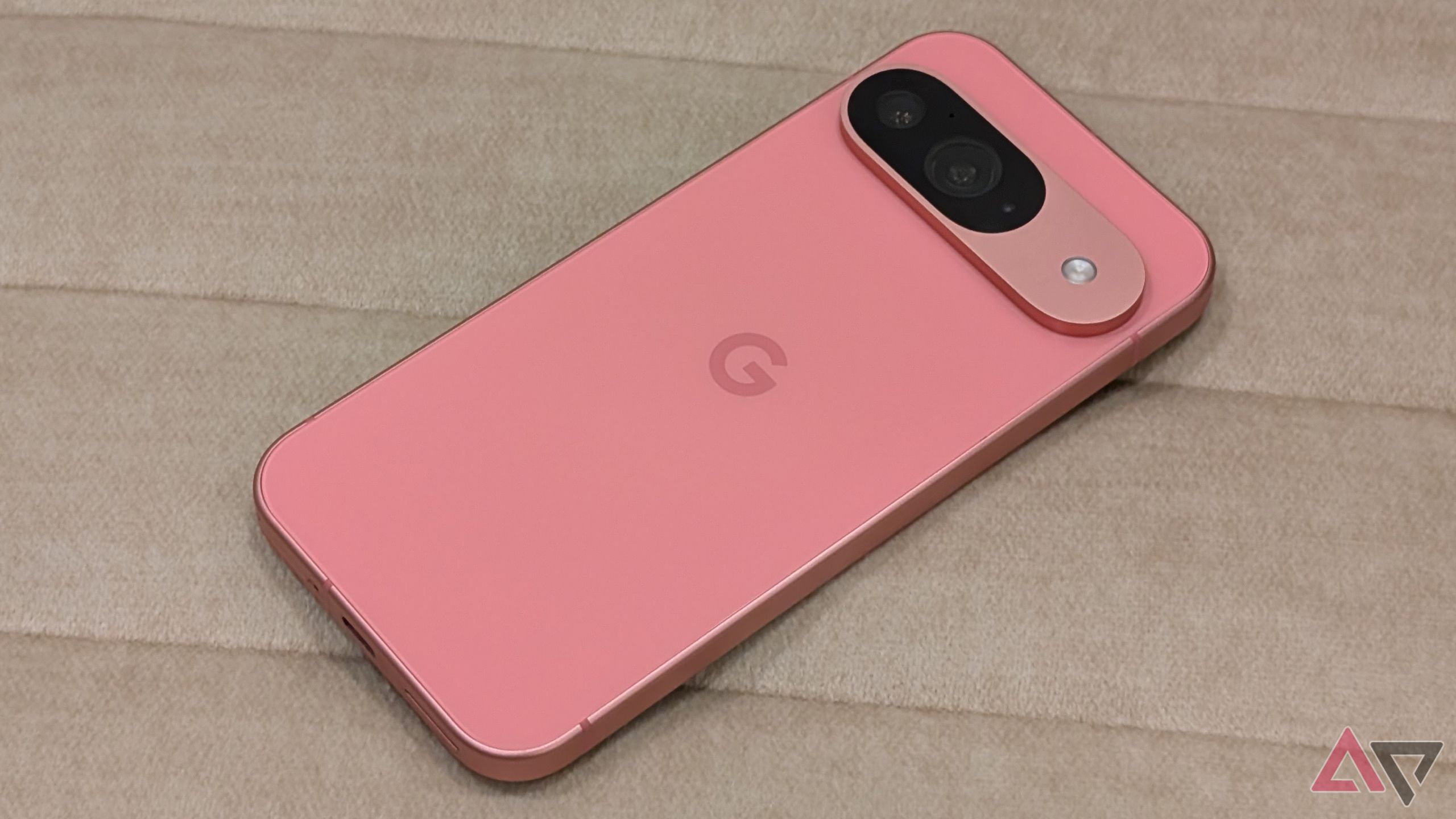 Google Pixel 9 on a white sofa
