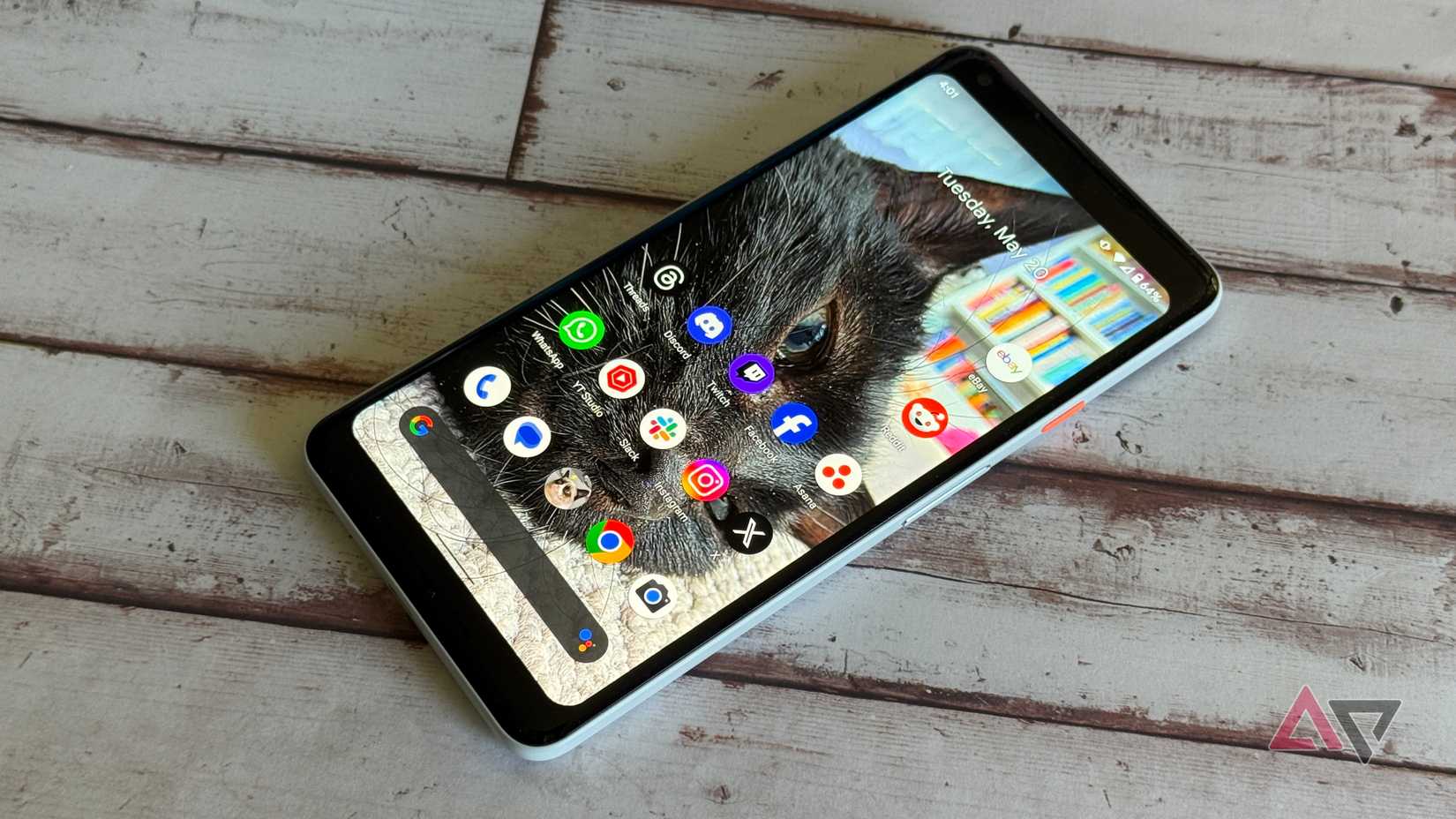 Samsung Galaxy A16 5G displayed with a vibrant orange background