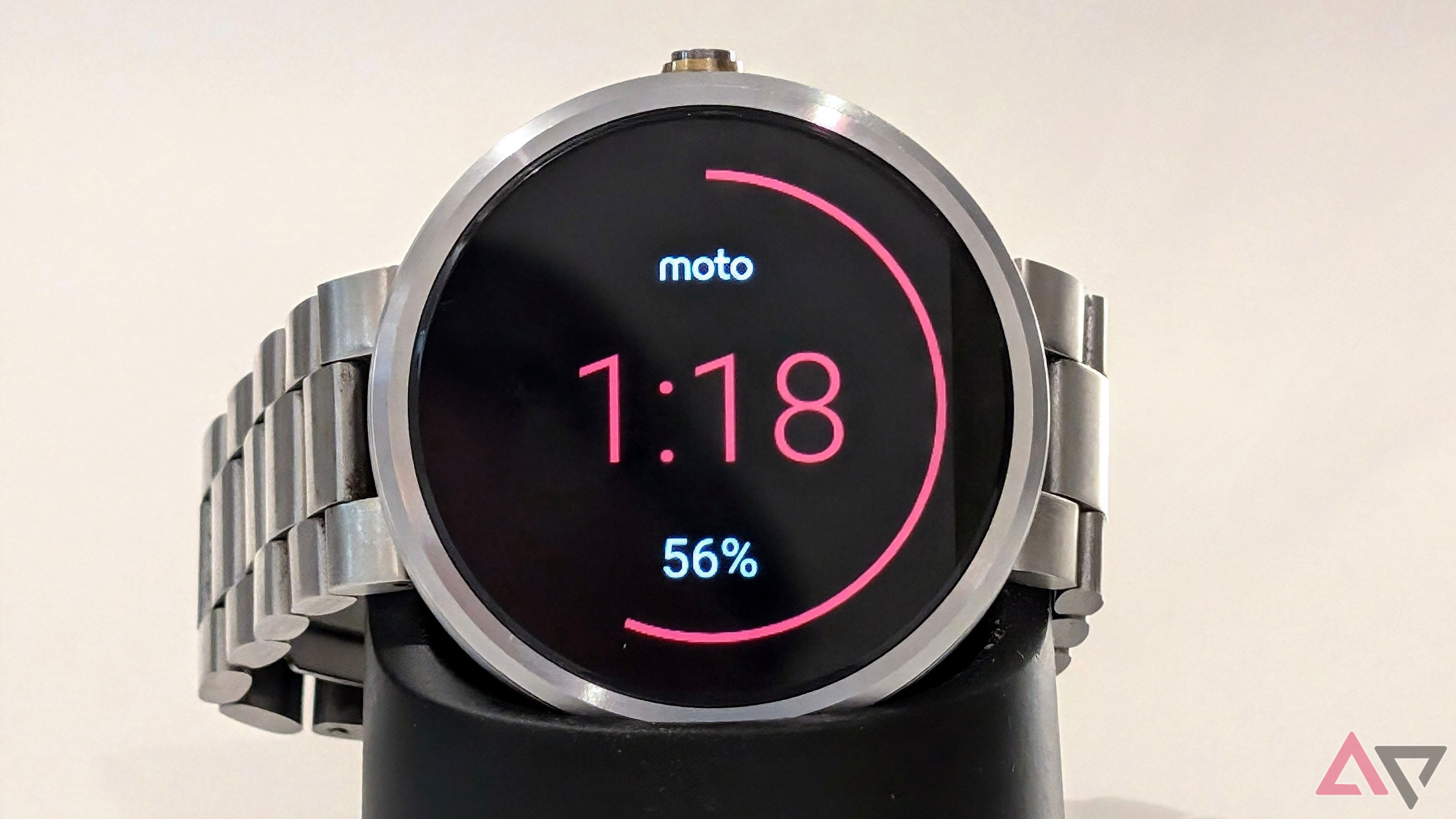A photo of a Moto 360 charging