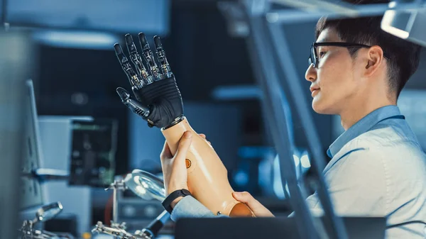 The world's first AI-powered bionic arm has been connected to Sarah, who lost a limb in an accident.