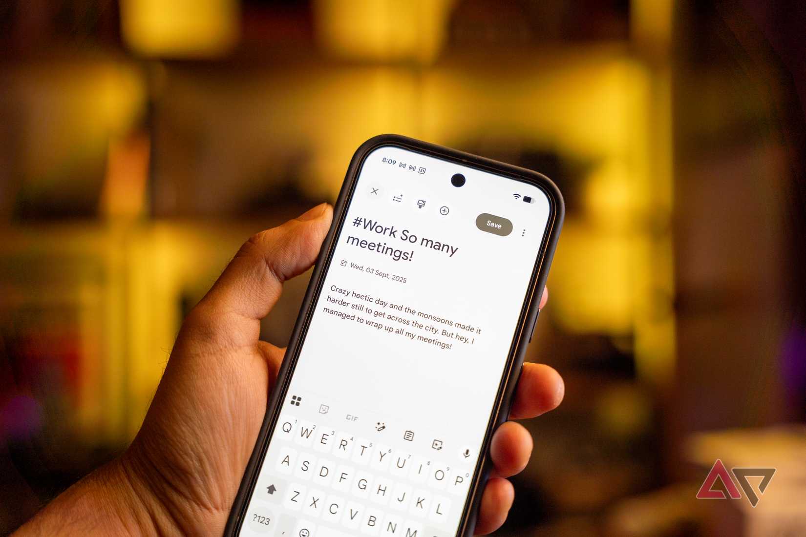 Google Pixel 9 on some orange fabric showing the rear of the phone