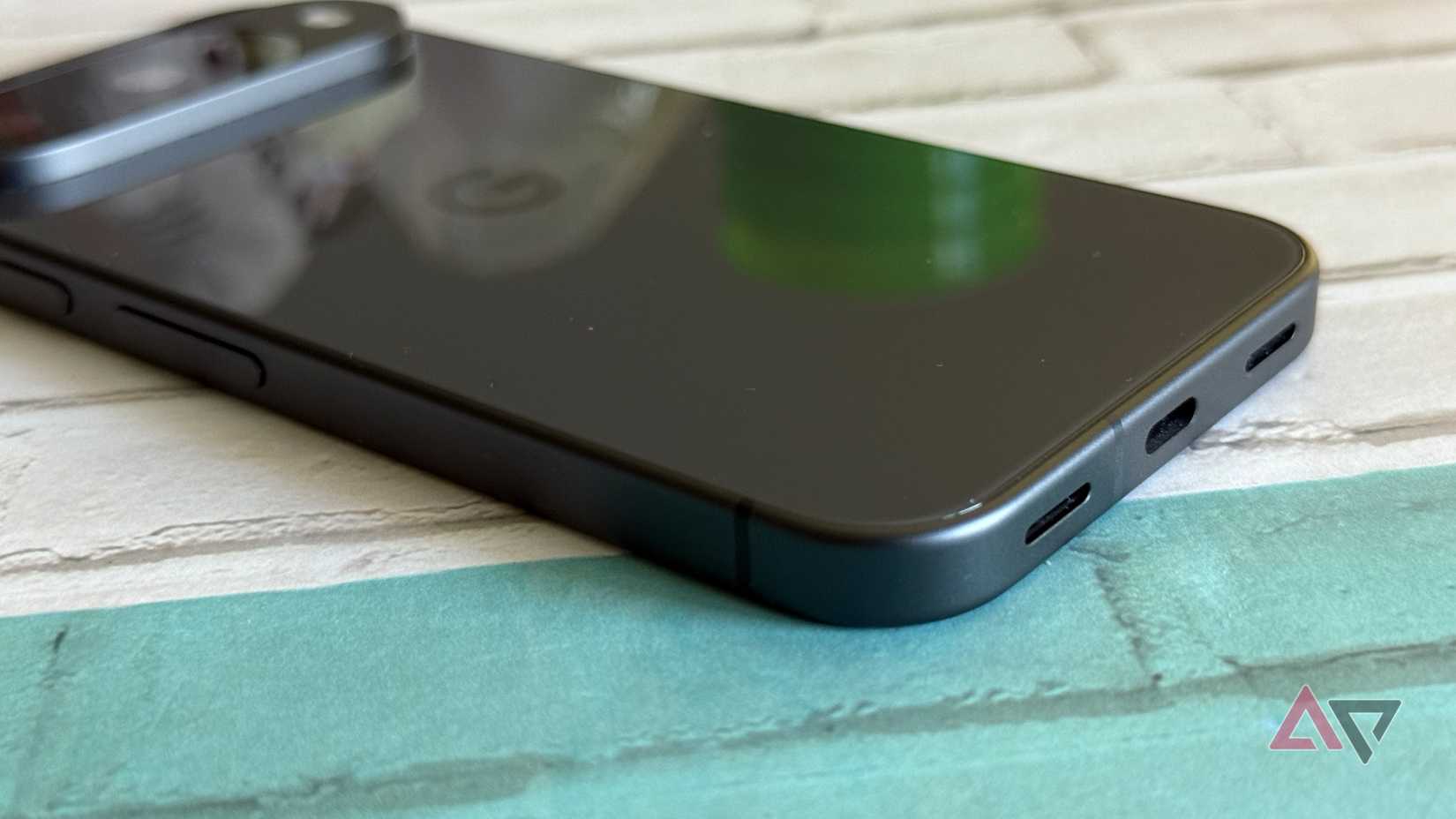 A Pixel 9 Pro with the Play Store and Play Store Collections widget shown on screen.