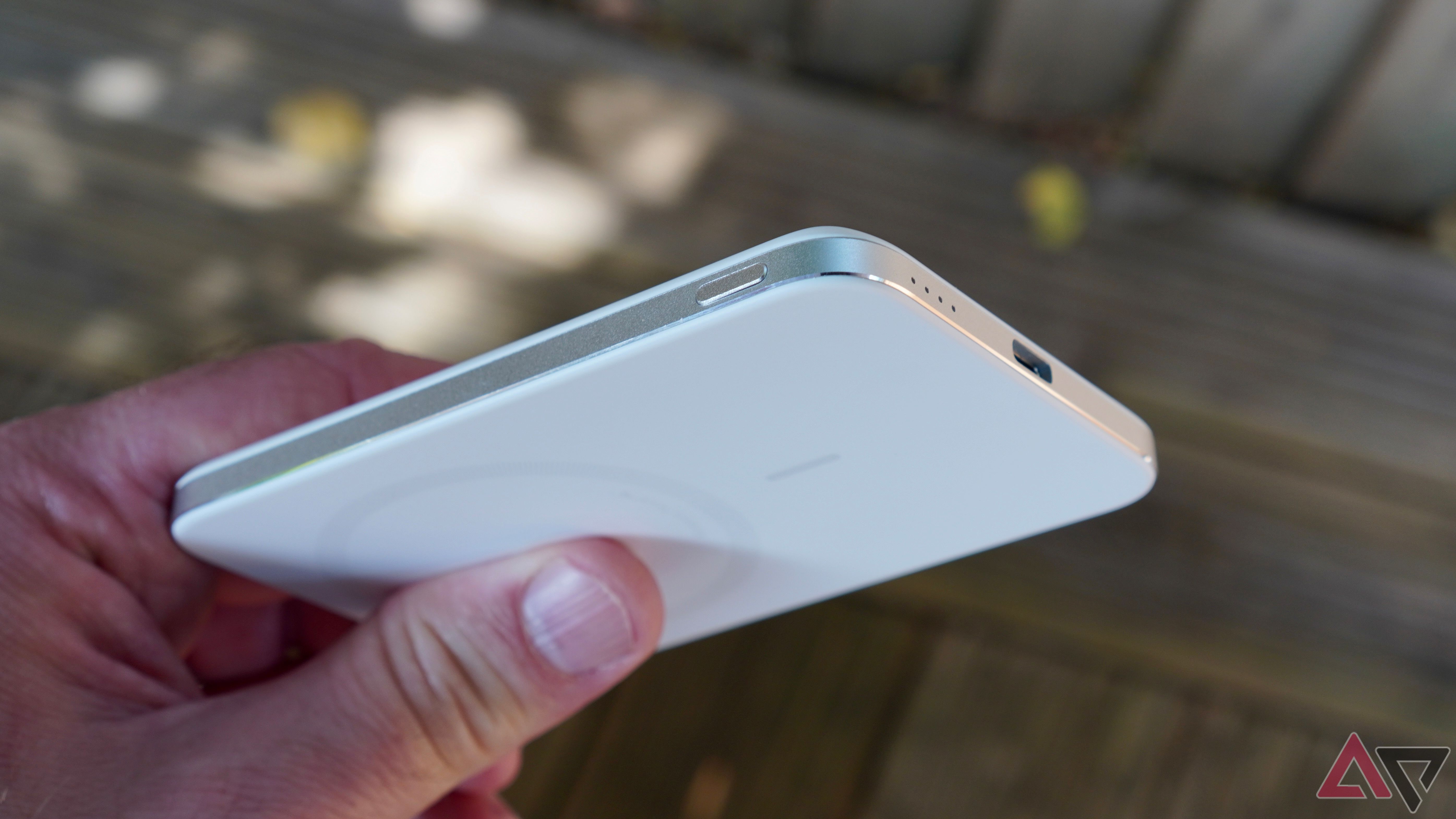 The Anker Nano Power Bank's side button and LEDs