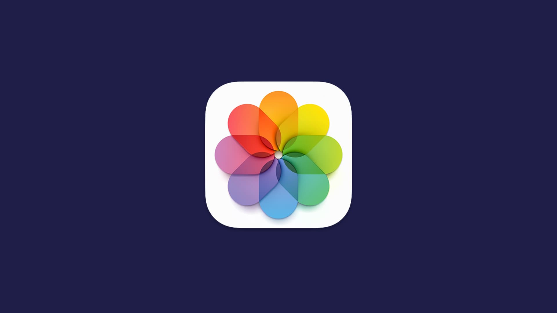 Apple Photos app icon on a solid blue background