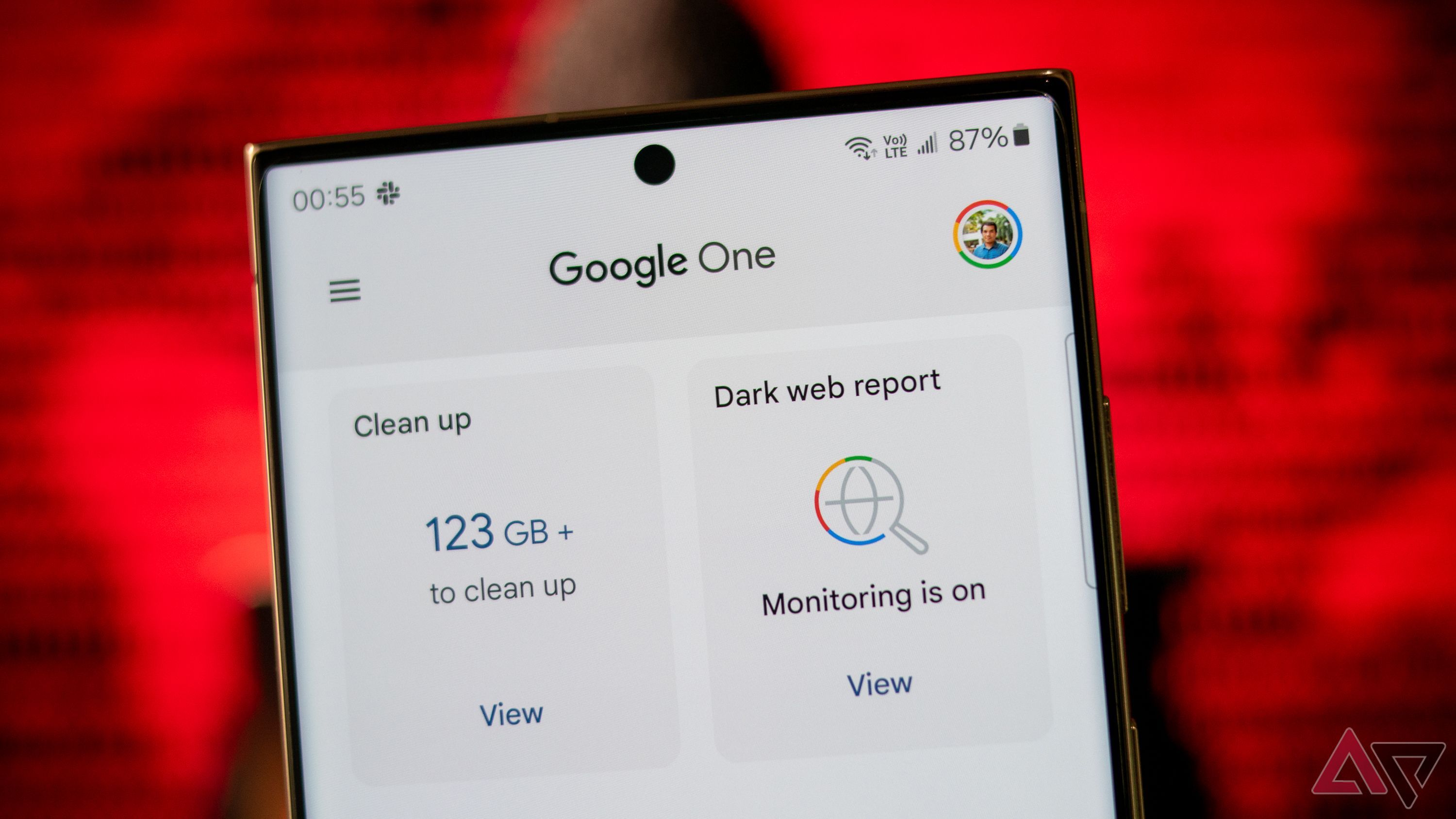 Google One on a smartphone showing the Clean up and Dark web report monitoring features