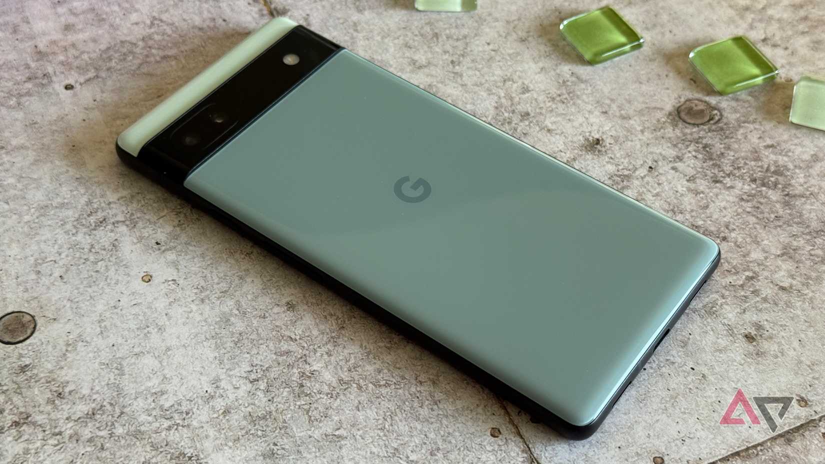 A full-body shot of the Galaxy S25 ultra facing down on a gray backdrop.