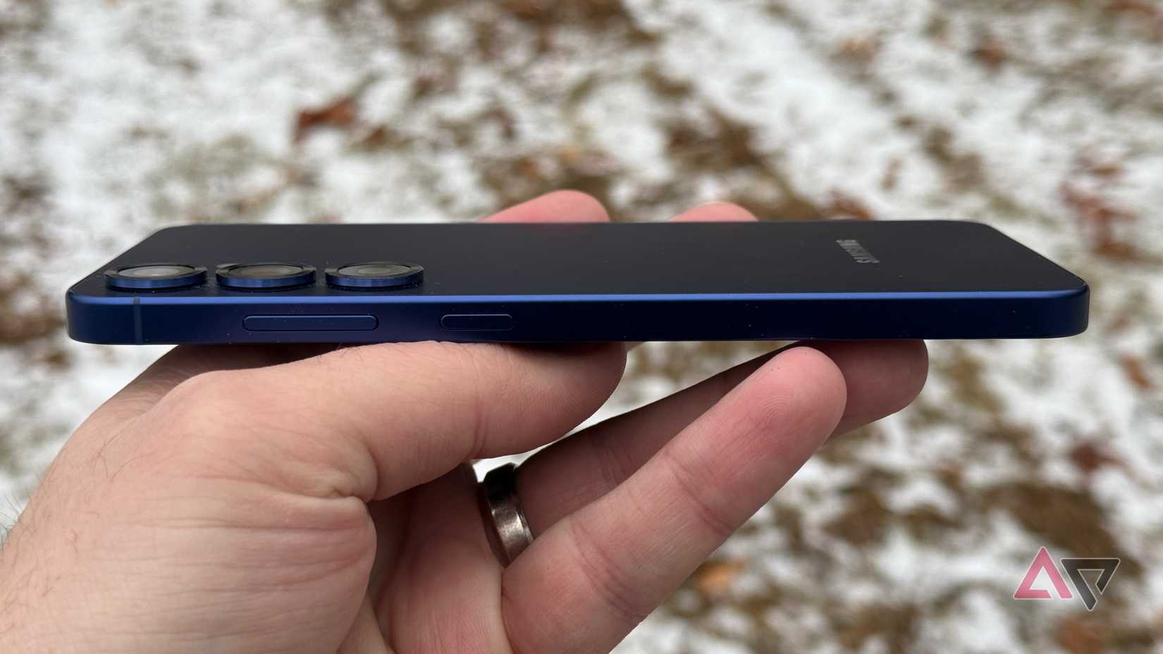 Motorola Edge 2025 display outdoors against a tree