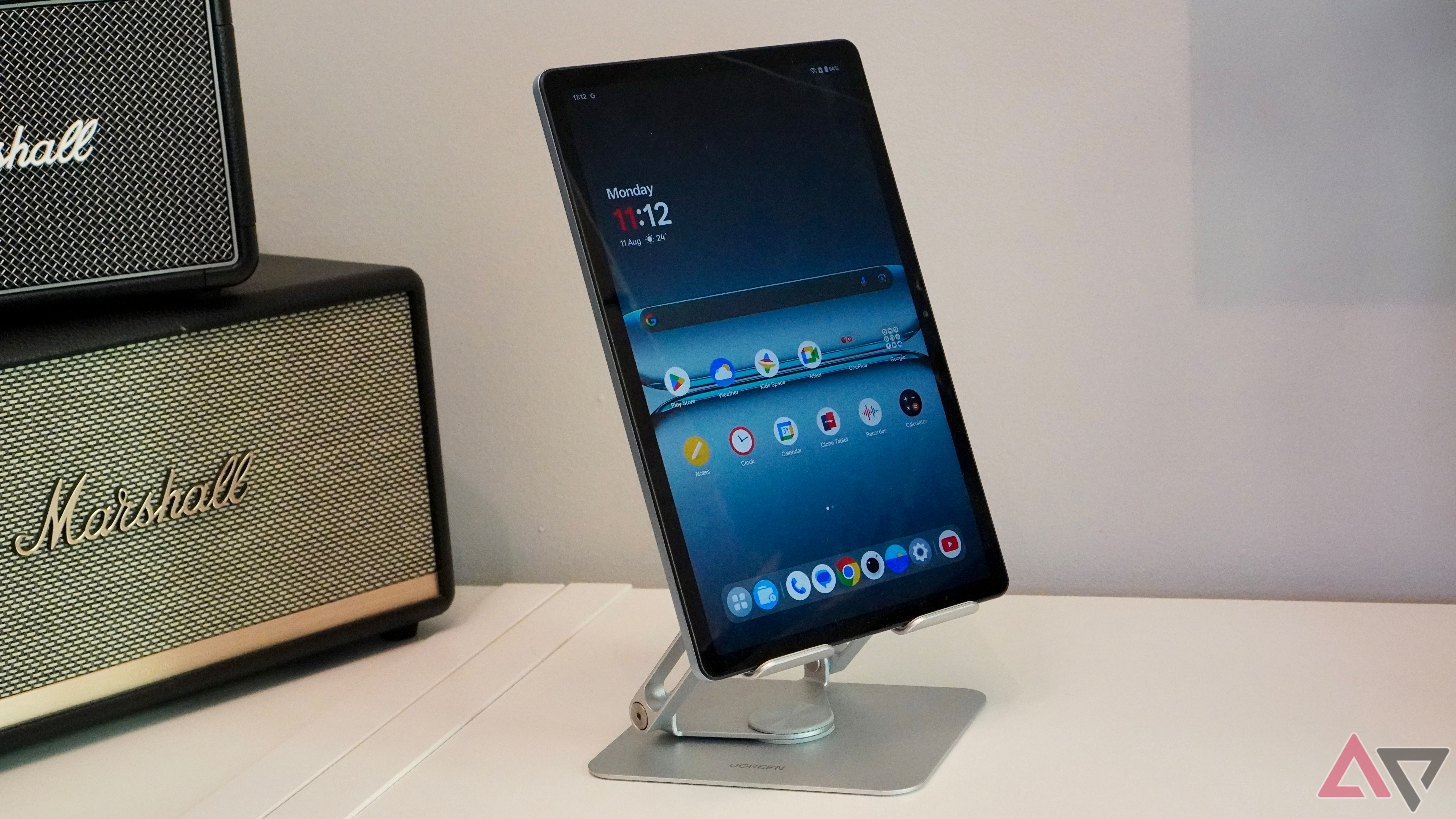 A OnePlus Pad Lite on the Ugreen Tablet Stand Holder, in portrait orientation
