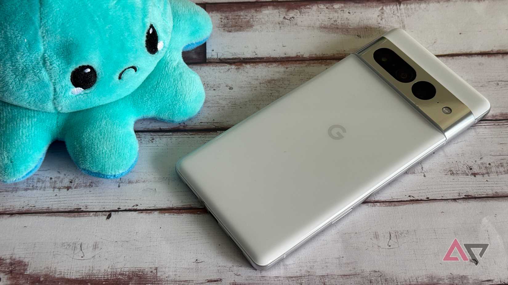 Android phone showing Google Home panel with Google Home icon in the background