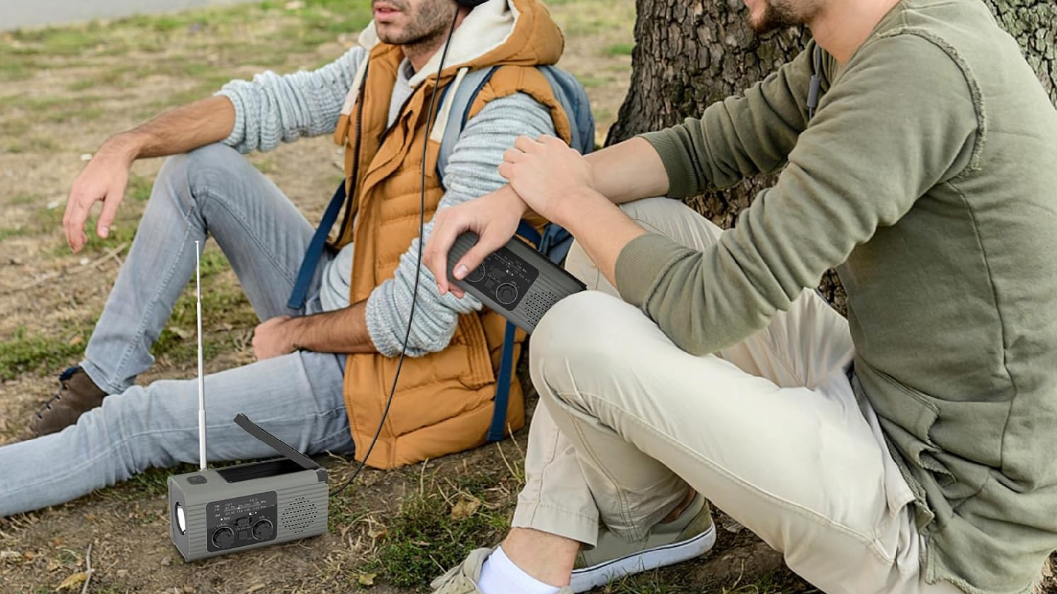 Person using Nitigo Emergency Radio 4000mAh Solar Hand Crank AM/FM/NOAA Portable Weather Radio