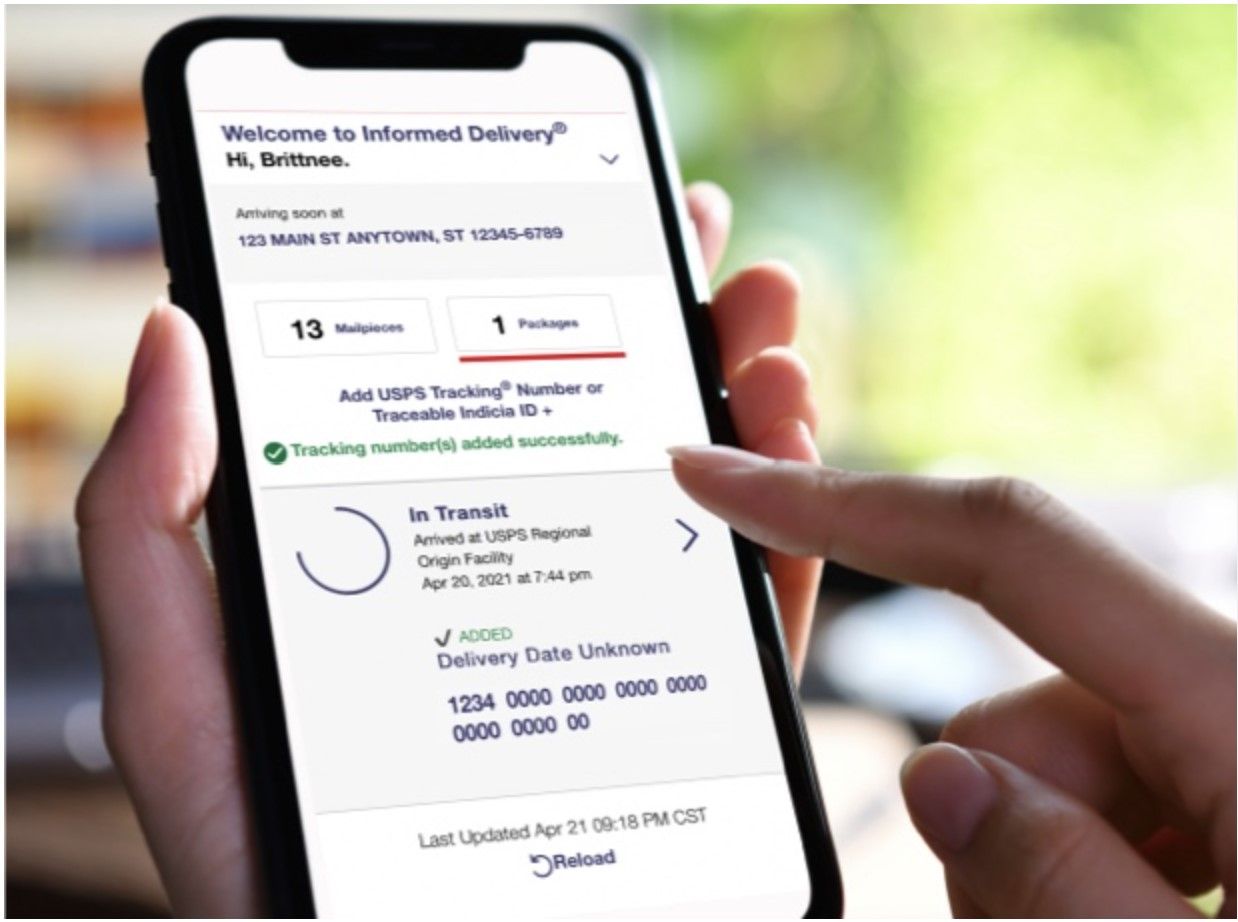 The USPS Informed Delivery website being used on a phone in someone's hand