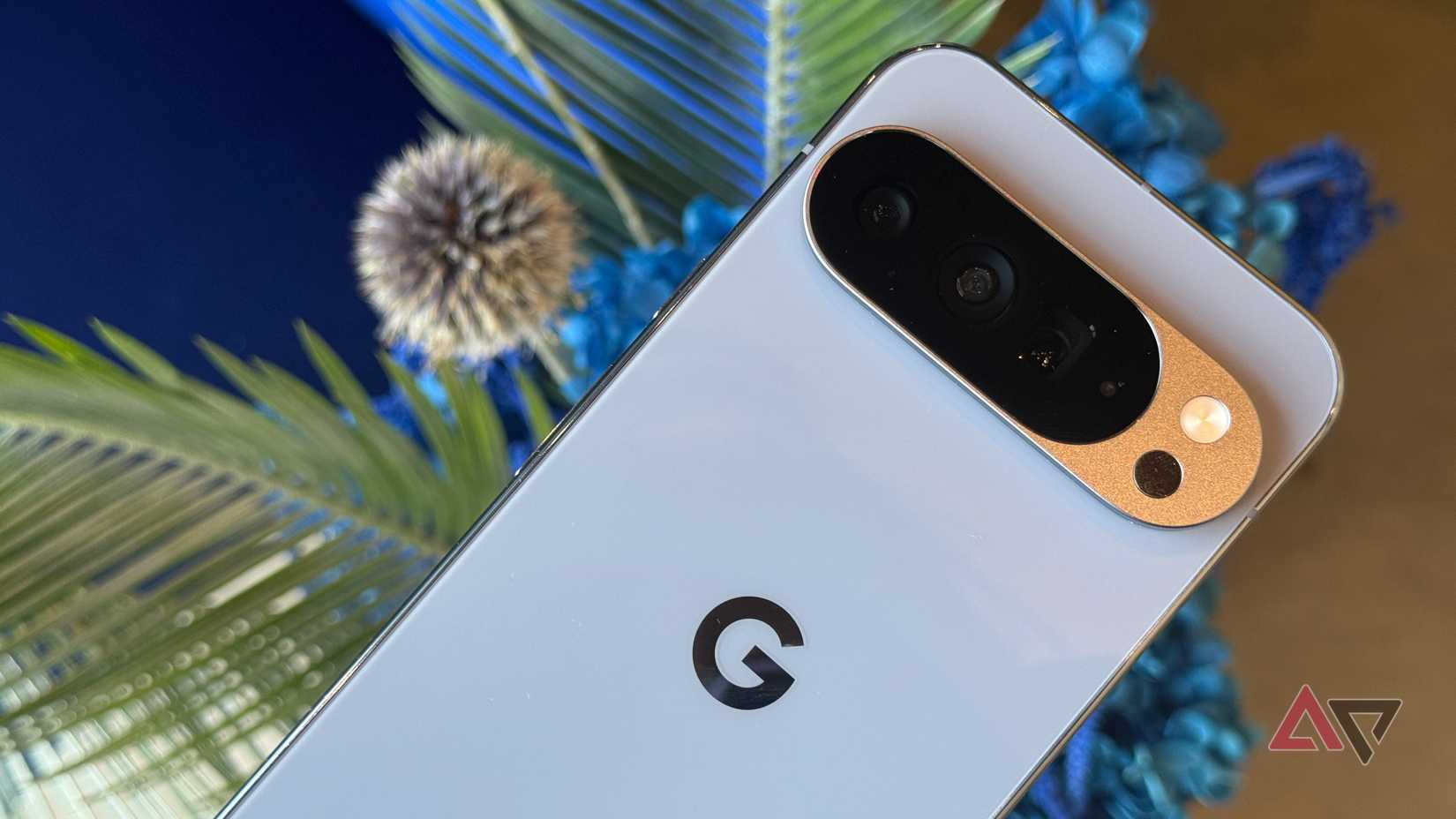 Pixel 9 Pro laying flat on a sofa