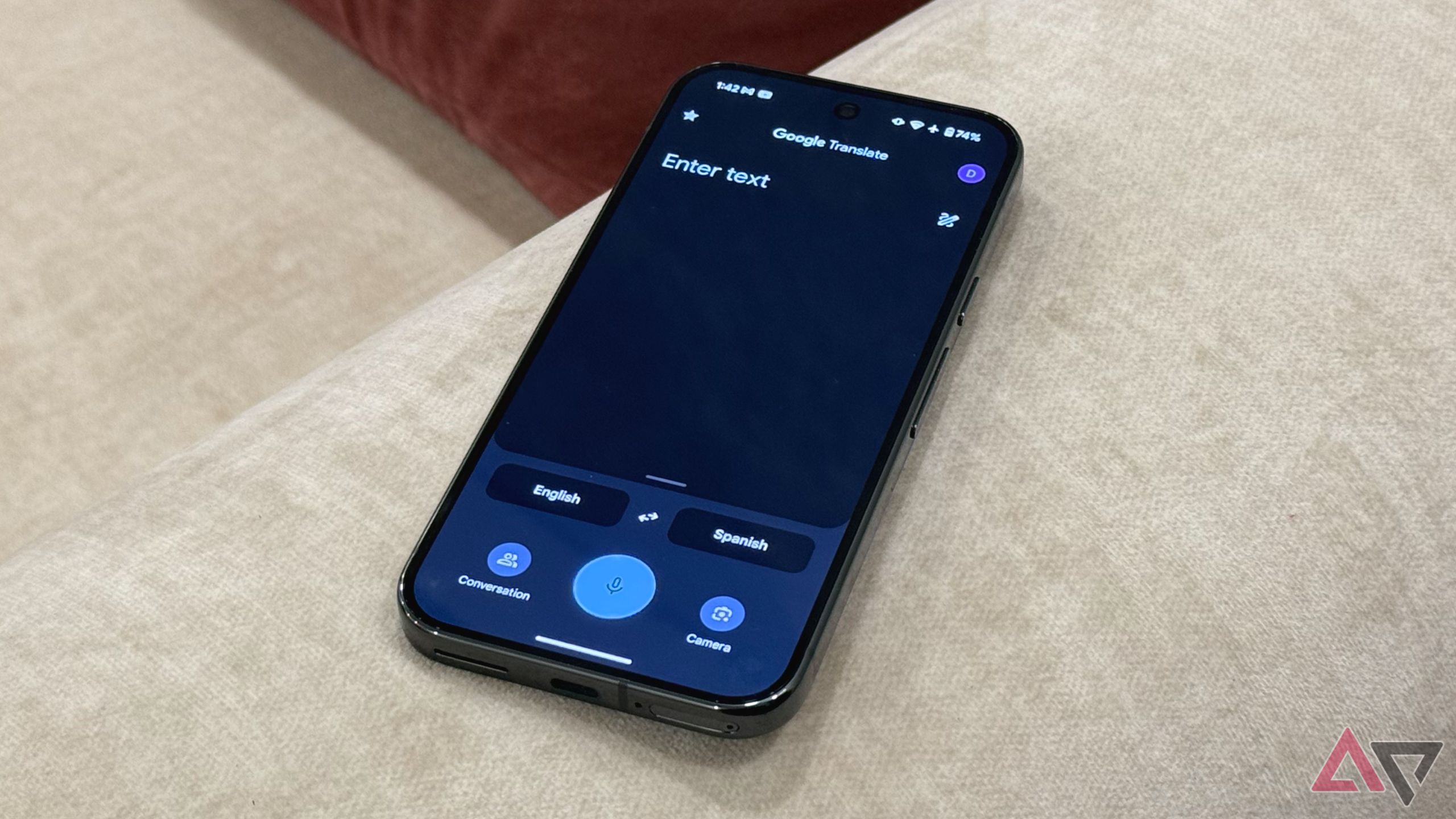 Google Translate app's home page with text, voice, and camera input options