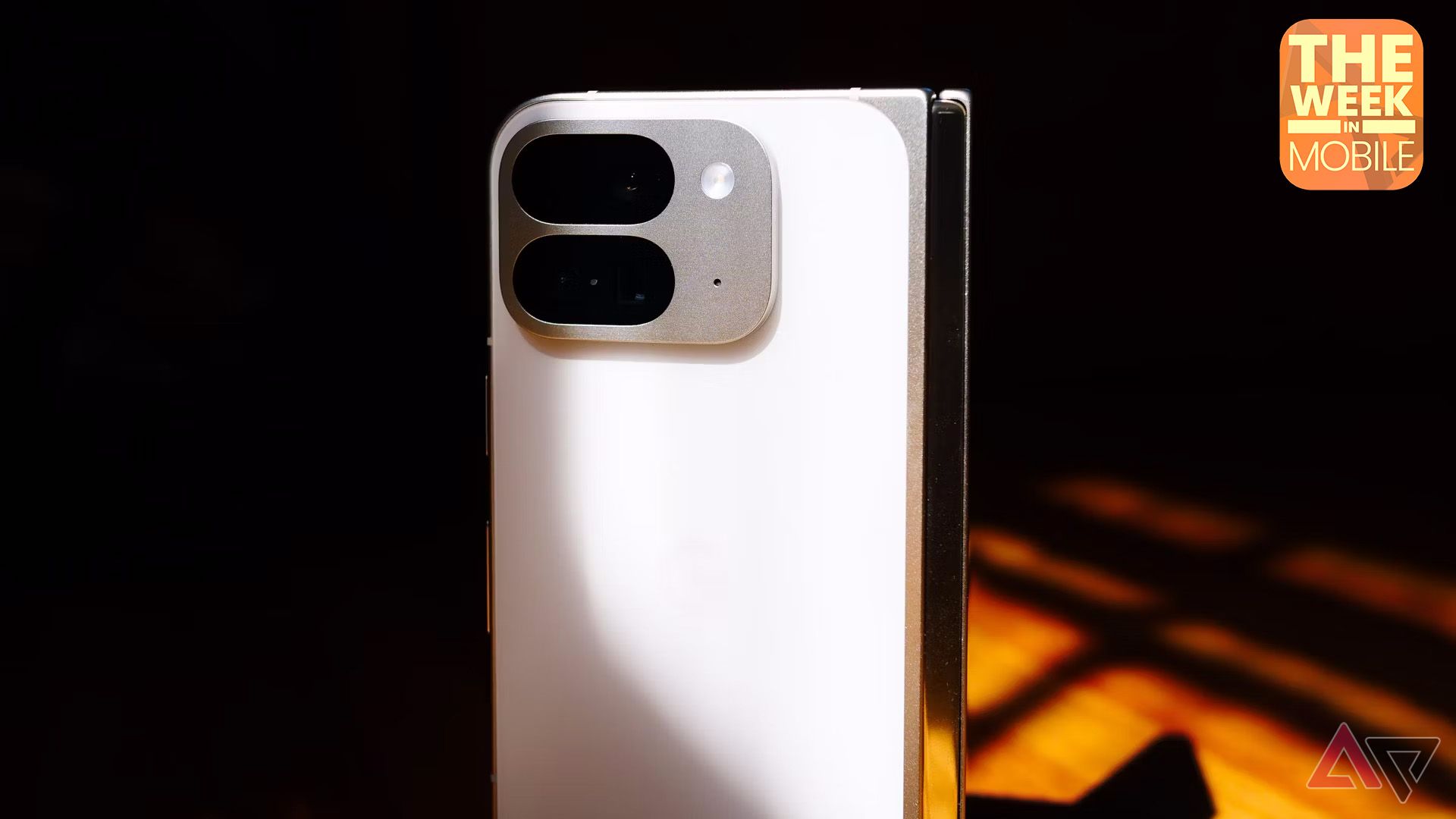 Photo of the Pixel 9 Pro Fold's back panel with "The week in mobile" shown in a corner.