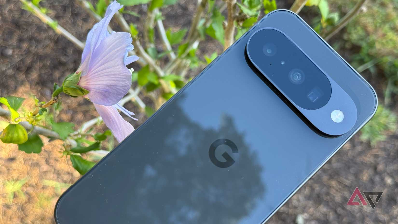 The Galaxy Z Fold 6 unfolded against a pink backdrop.