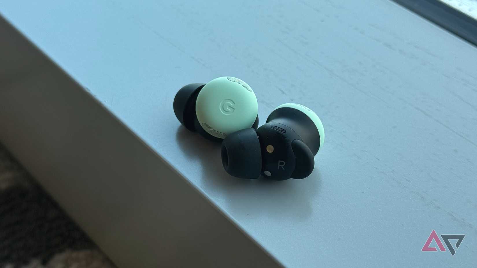 the Sony WF-C700N earbuds on a table in front of the open charging case