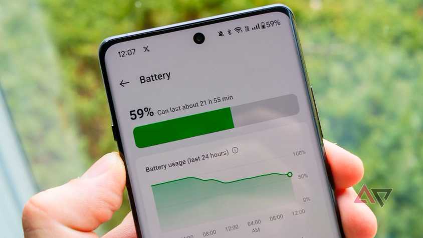 The Google Pixel 9 in pink on a purple background