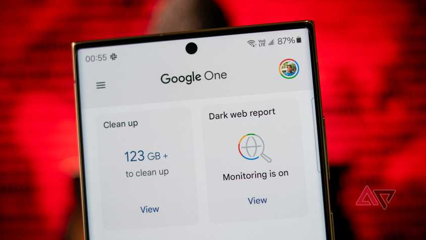 The words 'Google Wallet' against a black background with multi-color objects surrouding the words